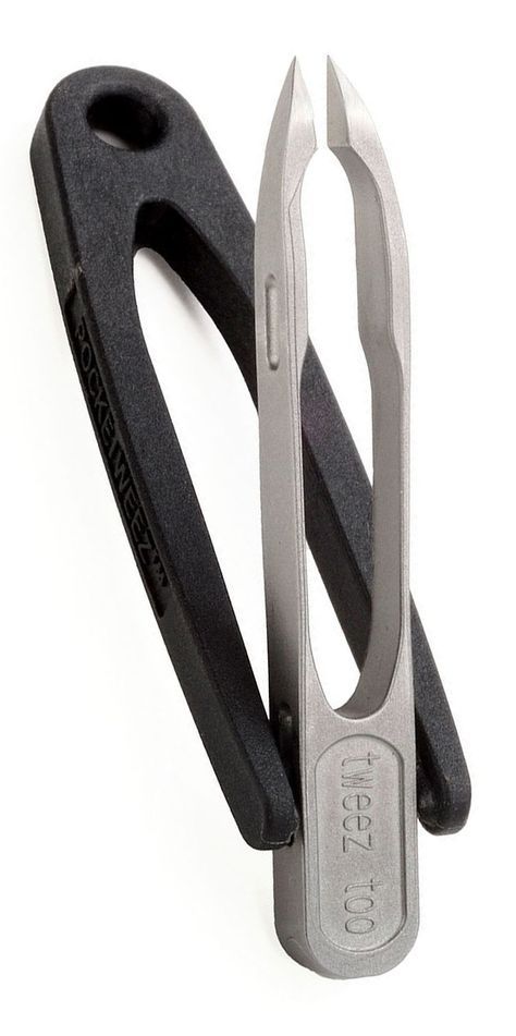 a pair of scissors sitting on top of each other