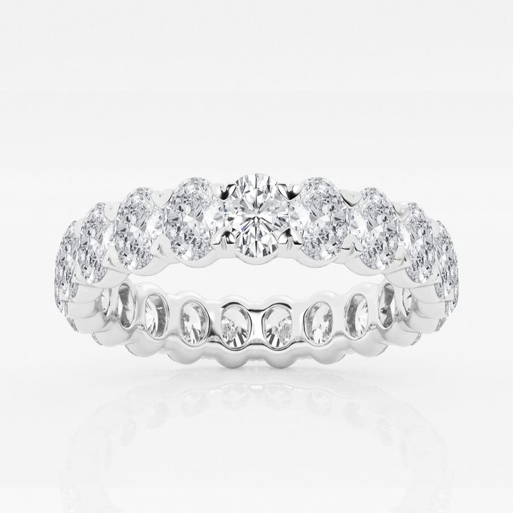 a white gold wedding ring set with round cut diamonds