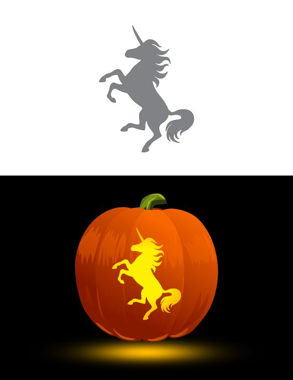 an orange pumpkin with a unicorn on it