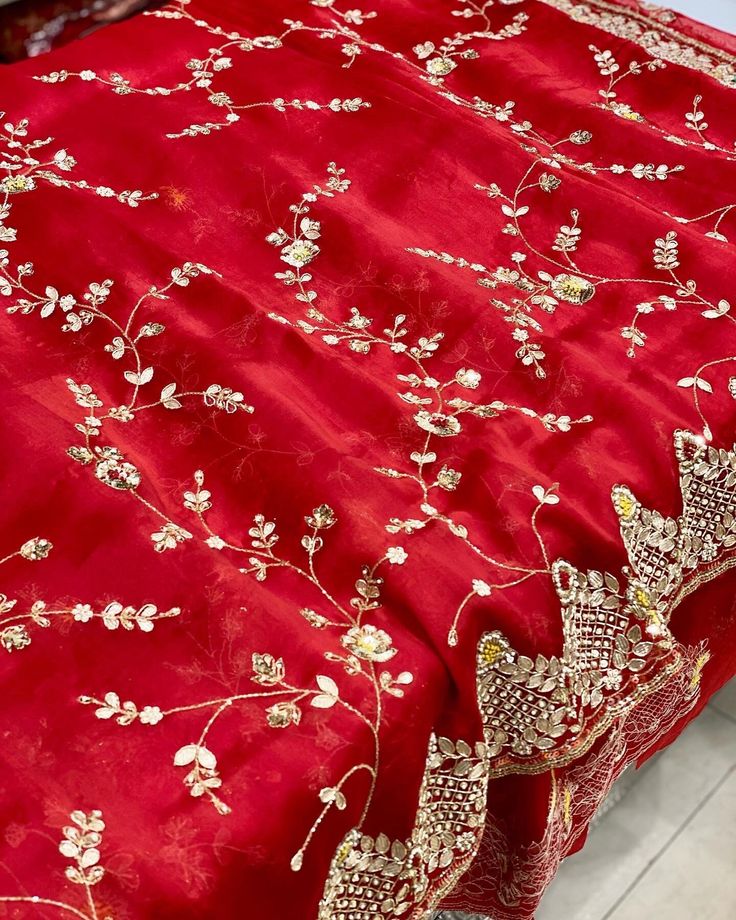 Hand Embroidery on Pure Organza Silk.  Hand Crafted.  Soft Organza.  Comes with Blouse Piece Red Unstitched Suit With Floral Embroidery For Eid, Elegant Red Unstitched Suit With Floral Embroidery, Luxury Wedding Saree, Red Unstitched Suit With Floral Embroidery, Red Floral Embroidered Unstitched Suit, Red Floral Embroidery Unstitched Suit, Elegant Red Traditional Wear With Floral Embroidery, Elegant Red Embroidered Blouse Piece, Elegant Embroidered Red Blouse Piece