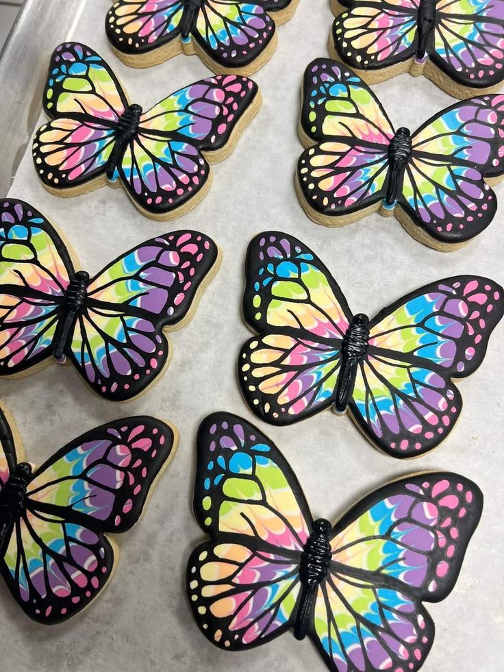 decorated cookies in the shape of butterfly wings