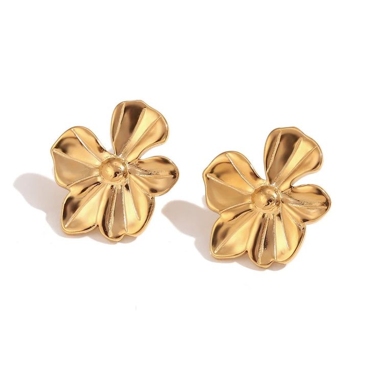 Add a pop of fun to your spring wardrobe with these Flower Statement Earrings! These large flower earrings are the perfect accessory to make a statement with your outfit. Embrace the spirit of the season with these playful and quirky earrings. DETAILS & SIZE Sold as a pair Finish: 18K gold plate Material: Stainless Steel Measurements: Large: 29mmx33mm; Medium: 19mmx16mmmm Weight: Large: 10.8 grams; Medium: 3.5 grams Comes with friction earring backs Waterproof, tarnish-resistant, and nickel free Shop Earrings to curate your ear stack! Chic Flower Charm Earrings For Gift, Chic Flower Charm Earrings As Gift, Chic Flower Earrings With Flower Charm, Chic Spring Flower Earrings For Pierced Ears, Chic Flower Earrings As A Gift, Trendy Flower Charm Earrings For Spring, Spring Flower Earrings For Pierced Ears, Chic Flower-shaped Earrings For Spring, Spring Flower Charm Earrings