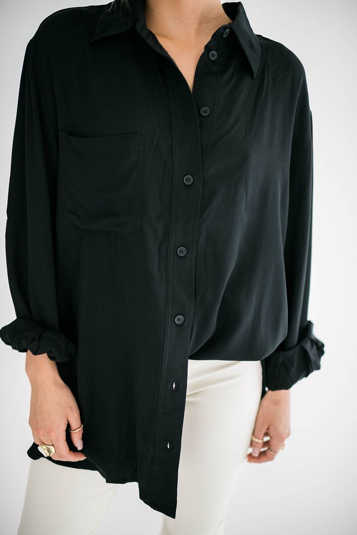 A timeless wardrobe essential that seamlessly combines style and comfort. Our Marino button up is designed with a modern, relaxed fit that drapes perfectly, providing a flattering silhouette for all body types. Size Chart Features: oversized fit collared neckline buttons front pocket buttoned cuffs fabric content: 100% rayon model is wearing a small. Height 5'7" Bust 34", Waist 25", Hip 36" Timeless Wardrobe, Oversized Fits, Body Types, Wardrobe Essentials, Front Pocket, Button Up, Size Chart, Relaxed Fit, Wardrobe