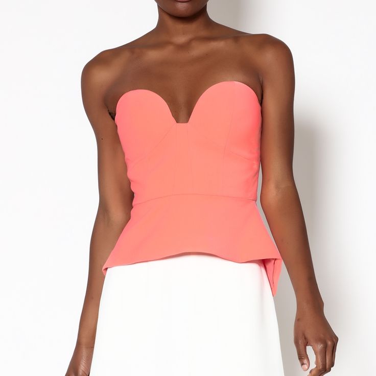 Bright Coral Strapless Bustier Top With A Sweetheart Neckline And Light Padding On Bust. Flared Bottom With Exposed Zipper Closure At The Back. Brand: Minty Meets Munt Fiber Content: 97% Polyester, 3% Spandex Chic Tops With Built-in Bra And Fitted Bodice, Elegant Pink Tops With Built-in Bra, Chic Fitted Bodice Sleeveless Tops, Chic Sleeveless Top With Fitted Bodice, Spring Strapless Top With Fitted Bodice, Chic Fitted Bodice Top For Night Out, Sleeveless Top With Boned Bodice For Night Out, Flirty Fitted Crop Top With Sweetheart Neckline, Sleeveless Tops With Boned Bodice