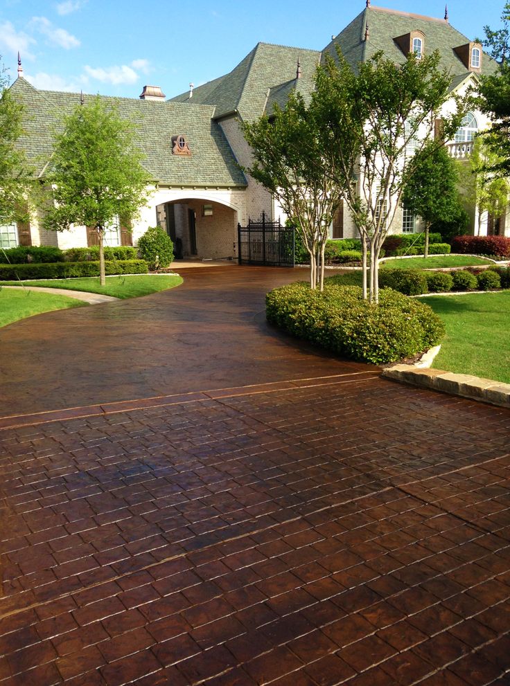 a large driveway in front of a house