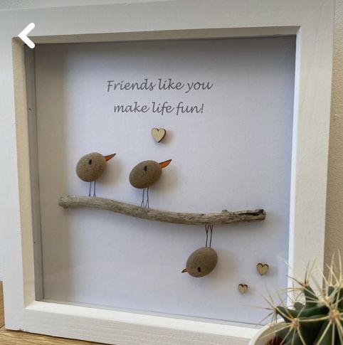 two birds are sitting on a branch in a shadow box with the words friends like you make life fun