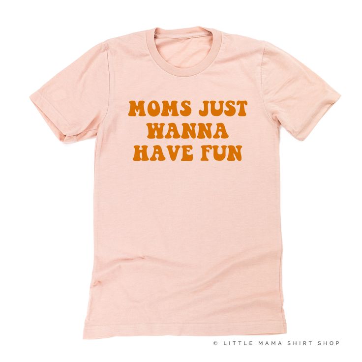 All Little Mama shirts are unisex sizing. They run slightly larger than typical women's shirts and slightly smaller than typical men's shirts. We recommend ordering your normal size for a regular fit. Please reference all size charts before purchasing. Spring Retro Pre-shrunk Shirt, Retro Crew Neck Shirt With Funny Text, Fun Funny Print Shirt, Retro Cotton Shirt With Funny Text, Funny Text Print Shirt For Spring, Spring Graphic Tee Shirt With Funny Text, Orange Short Sleeve Shirt With Text Print, Unisex Basic Tops With Funny Text, Orange Graphic Tee With Letter Print