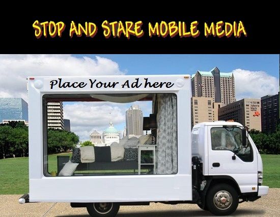 a white truck parked in front of a large cityscape with the words dream big on it's side