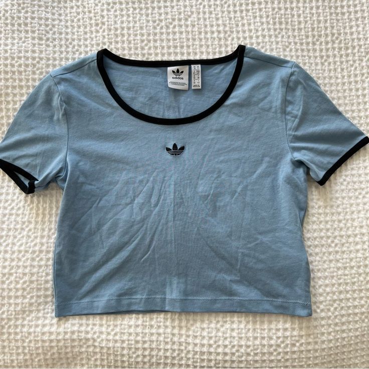 Never Worn Adidas Crop Tee Just A Little Wrinkled From Being Folded Adidas Crew Neck Summer Shirt, Casual Adidas Tops For Summer, Casual Adidas Summer Tops, Adidas Summer Tops With Crew Neck, Adidas Blue Tops For Spring, Adidas Short Sleeve Shirt For Spring, Adidas Cotton Shirt For Spring, Adidas Trendy Fitted Tops, Trendy Fitted Adidas Tops