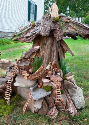 a tree stump that has been turned into a house