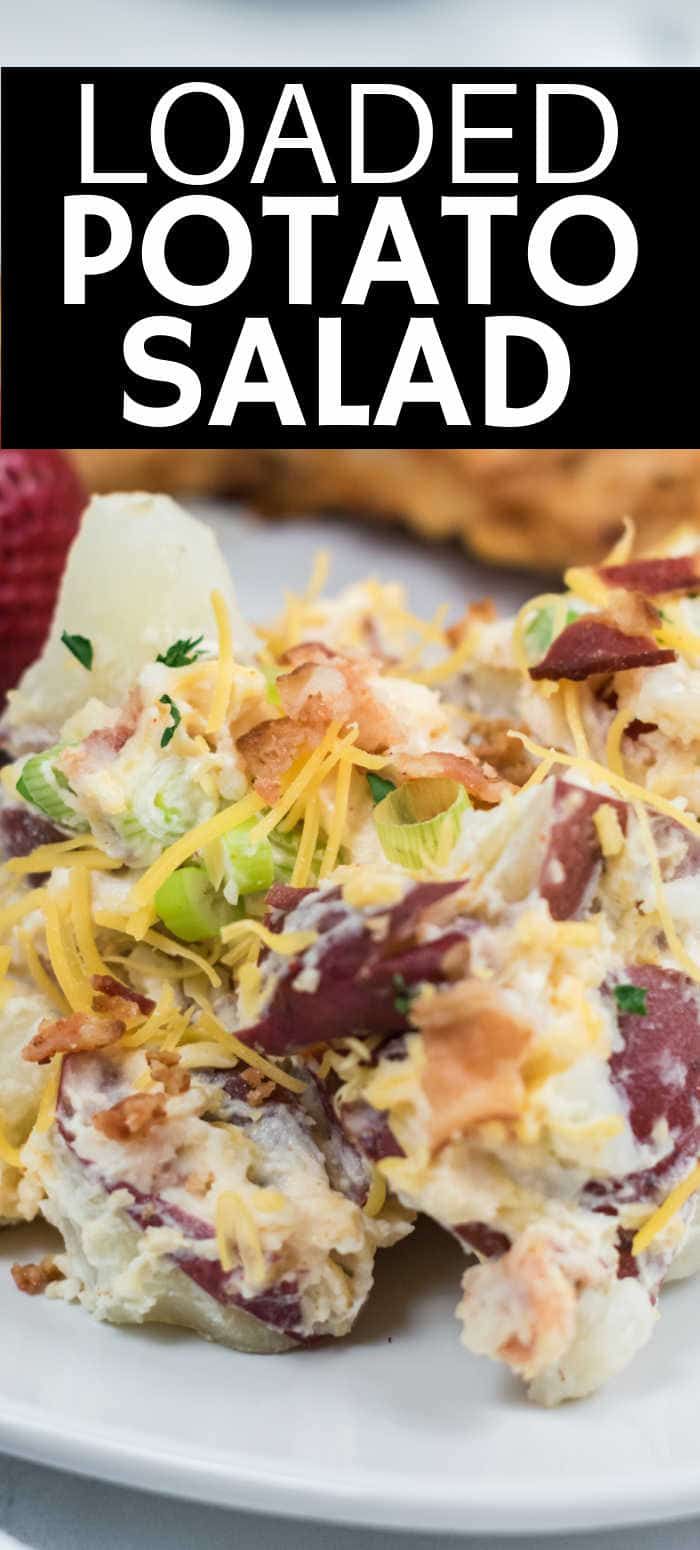 loaded potato salad on a white plate