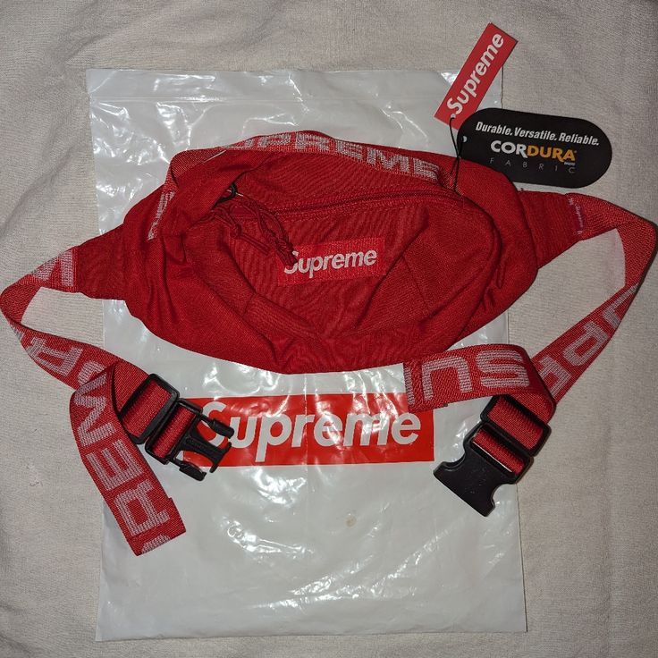 Ss18 Red Supreme Waistbag, Currently Going For $350 On Stockx I Have The Blue Supreme Sweatband As Well, Am Willing To Bundle Both For $400 Red Pouch Belt Bag For Travel, Red Travel Pouch Belt Bag, Red Travel Bags With Logo, Red Rectangular Bag With Logo, Red Shoulder Bag With Logo, Red Rectangular Bags With Logo, Red Logo Shoulder Bag, Red Logo Crossbody Shoulder Bag, Red Rectangular Belt Bag For Travel