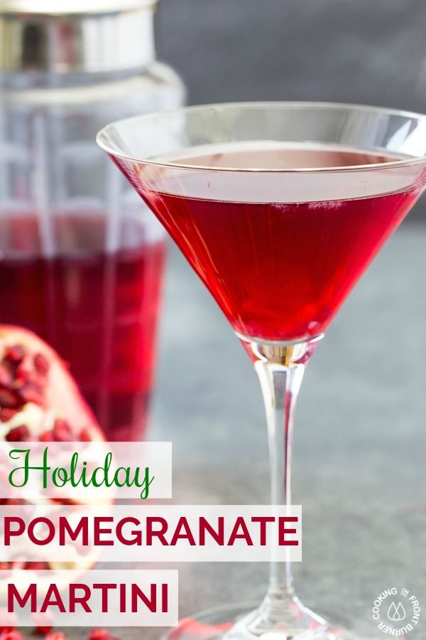 a pomegranate martini in a coupe glass with the words holiday pomegranate martini