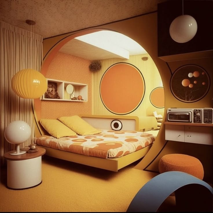 a bedroom with orange and yellow decor in the room, as seen through a circular mirror