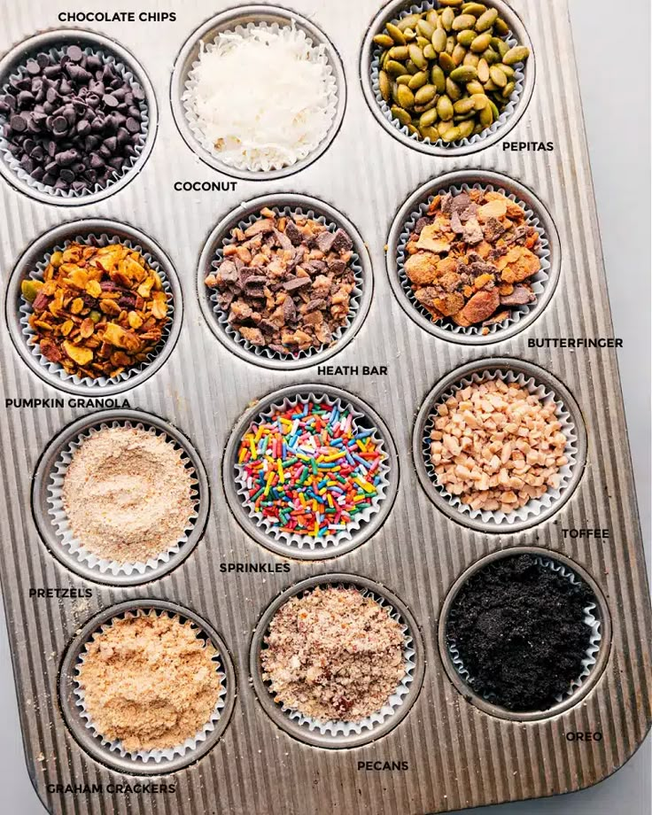 a muffin tin filled with lots of different types of toppings