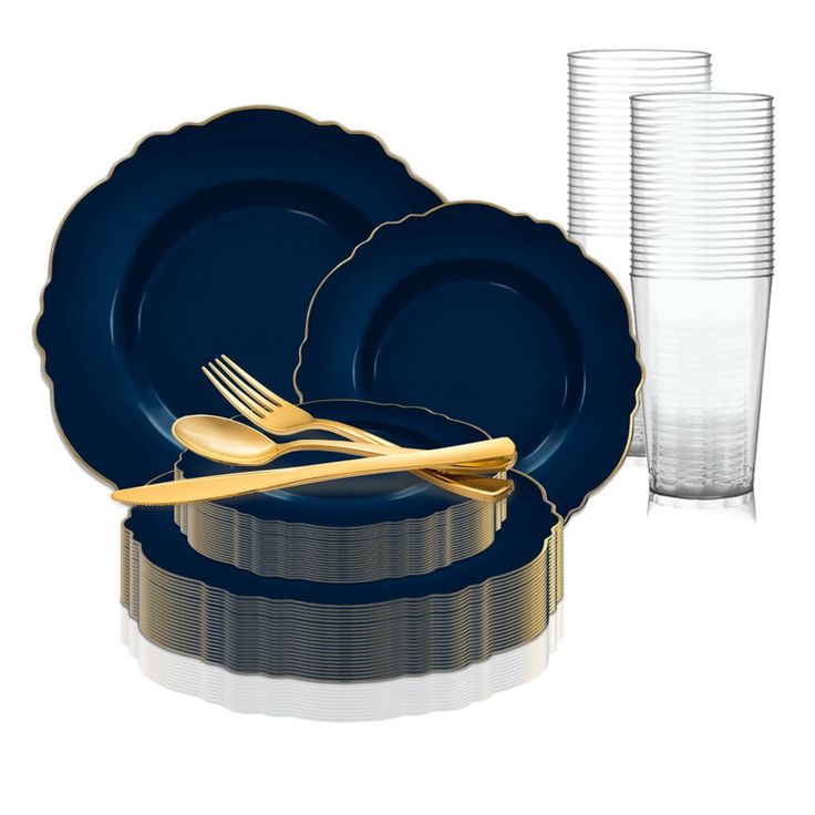 a set of blue plates and silverware on a white background