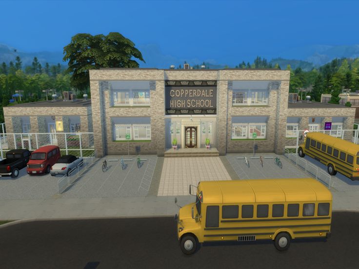 two school buses parked in front of a building