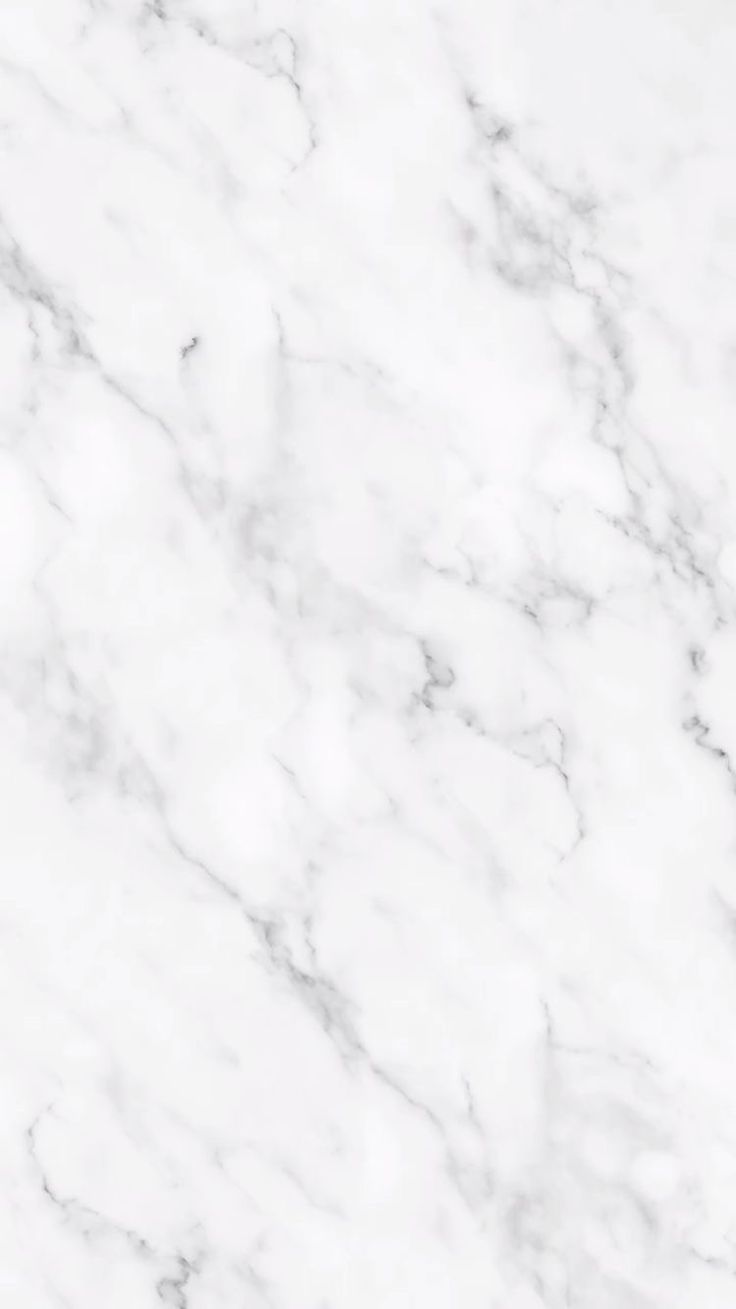 a marble counter top with white and grey veining on it's edges, as seen from above