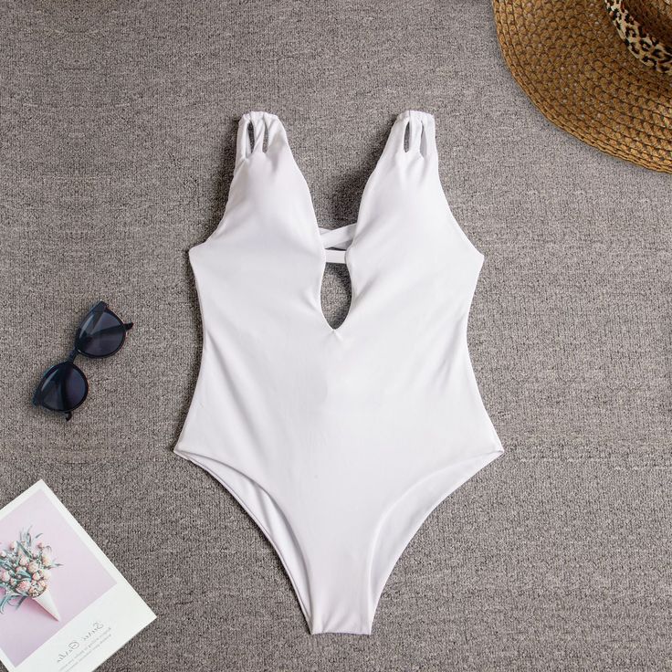 Embrace elegance and allure with our Sleek Backless Monochrome One-Piece Swimsuit. Crafted with a minimalist design and a daring backless silhouette, this swimsuit exudes sophistication and confidence. The smooth, high-quality fabric offers a comfortable fit, while the flattering cut enhances your curves. Whether lounging by the pool or strolling along the beach, make a statement with this chic swimwear essentialWhether with steel tow: With chest pad without steel towColor: WhiteSize: S, M, LSty Solid Backless One-piece Swimsuit, Solid Color Low Back Bodysuit For Pool, Solid Color Low-back Bodysuit For Pool, Elegant Bodysuit For Sunbathing Beach Season, Summer Backless Bodysuit For Pool, Summer Low Back Bodysuit For Sunbathing, Solid Backless Bodysuit For Swimming, Summer Backless Bodysuit With Lined Body, Solid Backless Bodysuit For Vacation