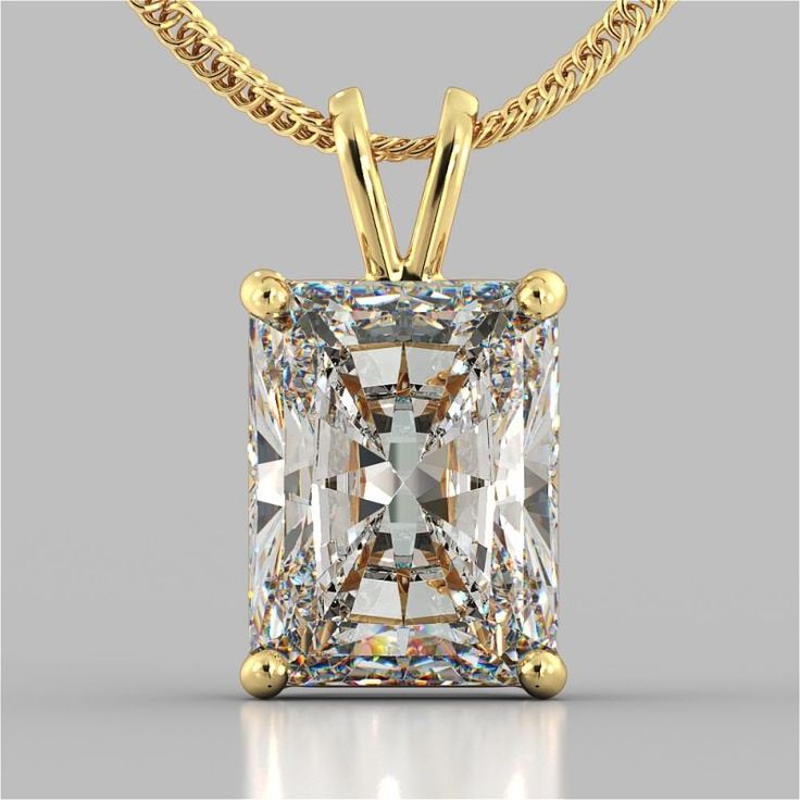 This gorgeous solitaire pendant features a new and improved cut, much more brilliant than the traditional emerald cut, Swarovski cubic zirconia stone set in four-prong basket setting. Available in 14K white gold, 14K yellow gold, or 14K rose gold. 1 carat = 6mm x 4mm 1.5 carat = 7mm x 5mm 2 carat = 8mm x 6mm Chain is not included. Visit our store: https://www.etsy.com/shop/SimonZJ Classic emerald cut: https://www.etsy.com/your/shops/SimonZJ/tools/listings/861626358 14k Gold Solitaire Necklace With Emerald Cut Diamond, Emerald Cut Cubic Zirconia Solitaire Necklace For Wedding, Gold Solitaire Necklace With Emerald Cut Diamond Accents, Gold Solitaire Necklace With Emerald-cut Diamond Accents, Gold Jewelry With Single Radiant Cut Diamond, Gold Radiant Cut Single Diamond Jewelry, Radiant Cut Single Diamond Gold Jewelry, Gold Solitaire Necklace With Emerald Cut Prong Setting, Classic Gold Solitaire Necklace With Emerald Cut