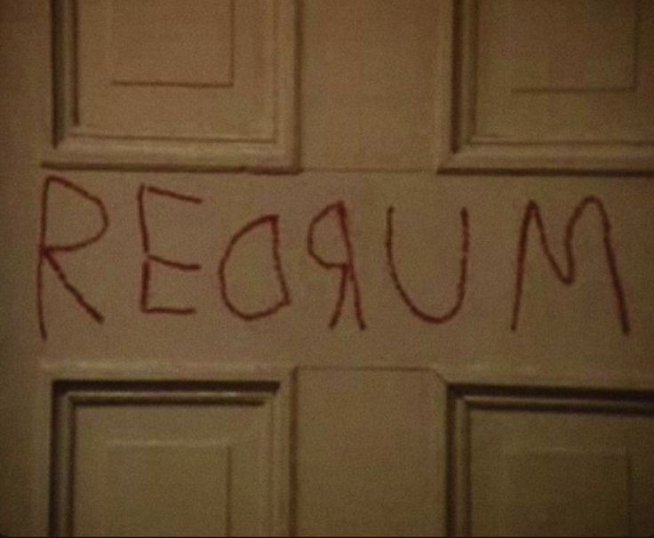 the word'return'written in red ink on a door