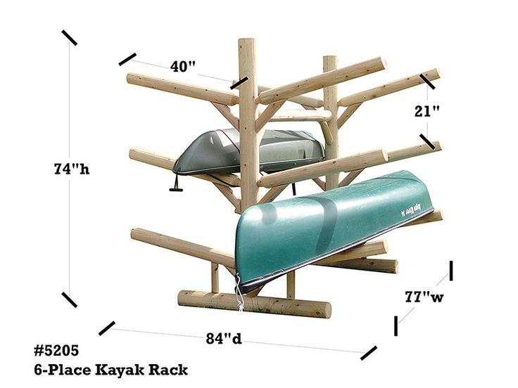 a wooden structure with two canoes attached to the top and one boat on the bottom