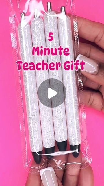 the 5 minute teacher gift includes five white pens with black tips and a pink background