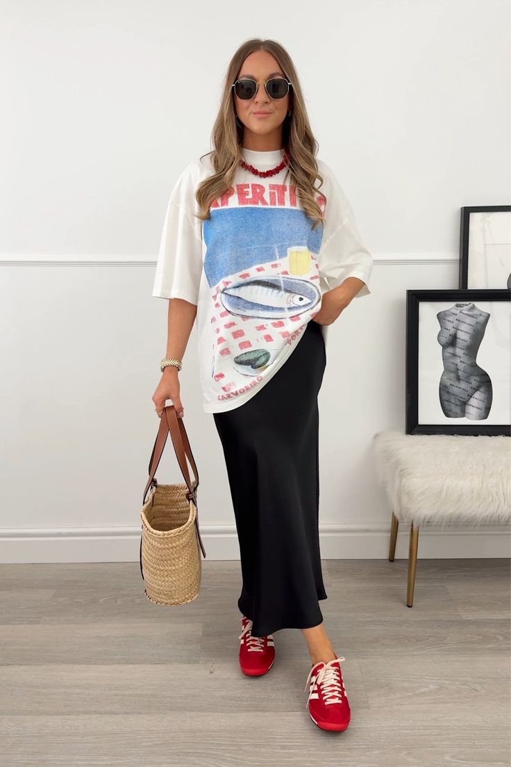 Midi satin skirt - Woman curated on LTK Satin Skirt White Sneakers, Midi Skirt And Trainers Outfit, Satin Skirt Sneakers Outfit, Satin Skirt Tshirt Outfit, Satin Skirt And Sneakers Outfit, Summer Satin Skirt Outfit, Skirt And Tshirt Outfits, Skirt Tshirt Outfit, Graphic Sweater Outfit