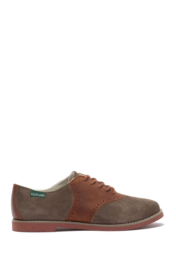 Brogued leather saddles soft suede on these classically styled derby shoes.Sizing: True to size. M=medium width Low-top Oxfords With Contrast Sole, Classic Brown Suede Lace-up Shoes, Fall Cap Toe Oxfords With Rubber Sole, Fall Oxfords With Rubber Sole Cap Toe, Low-top Suede Oxfords For Work, Suede Brogue Oxfords For Derby, Derby Suede Brogue Oxfords, Classic Almond Toe Oxfords With Suede Lining, Suede Low-top Oxfords For Work