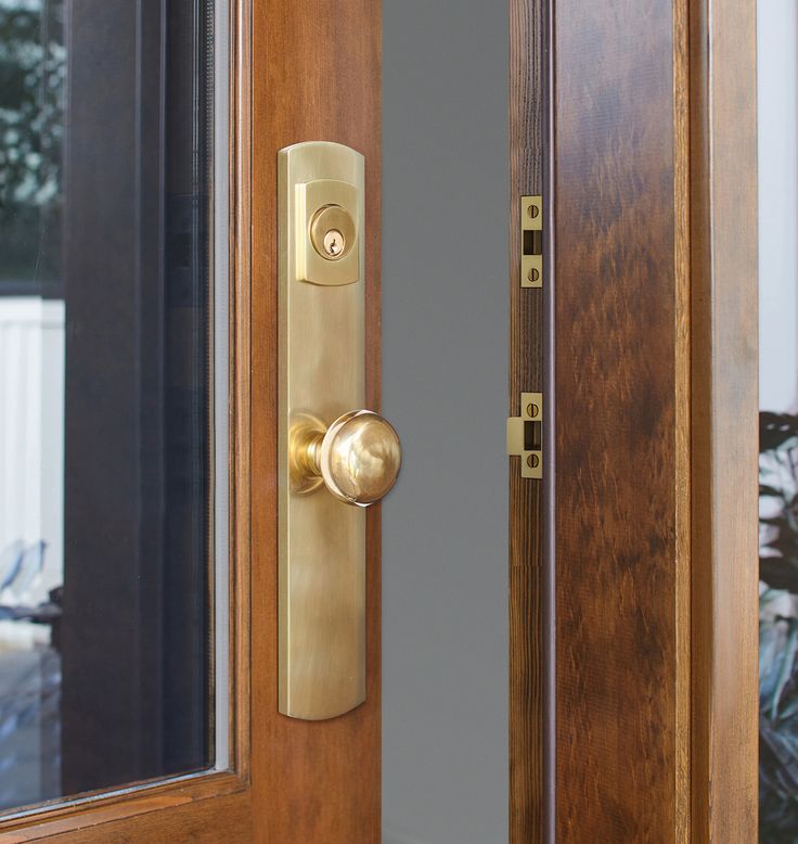 an open door with a handle on the front and side panels, in wood grained finish