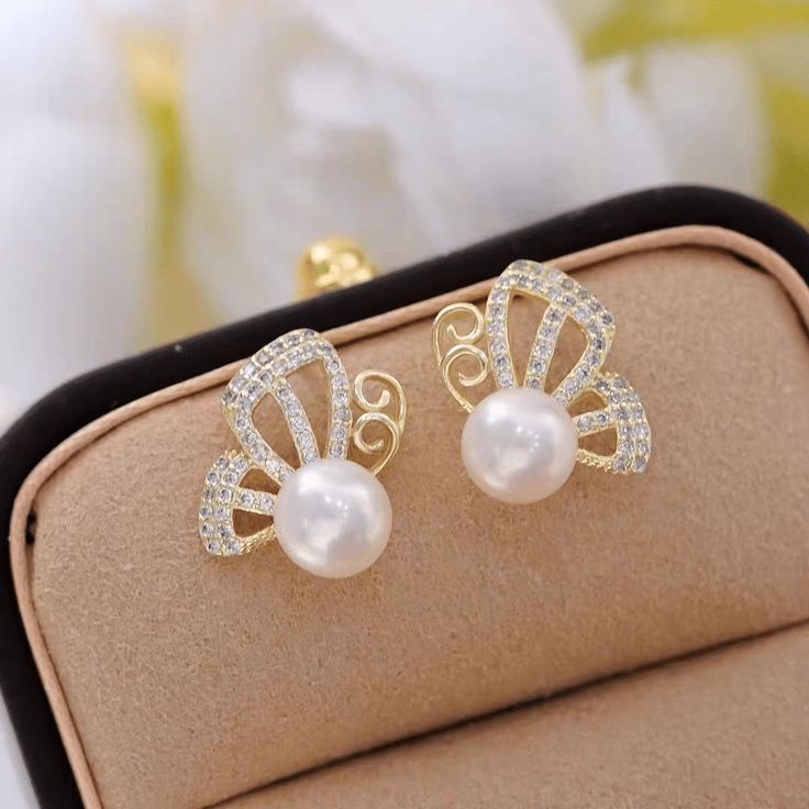 Description:Pearl Butterfly Earrings Specifications:Size: 2.2 cm * 1.6 cmWeight: 2.6 g/pairMaterial: Copper, Cubic Zirconia, Pearl, S925 silver, GoldColors: Gold "Flutter into style with our Pearl Butterfly Earrings! Let these delicate beauties add a touch of elegance to any outfit. Perfect for any occasion, these earrings will make you feel like a true fashionista. Fly high with these stunning earrings today!" Hollow Earrings, Pearl Butterfly, The Hollow, Fly High, Hollow Design, Stunning Earrings, Butterfly Earrings, Exquisite Jewelry, Jewelry Pieces