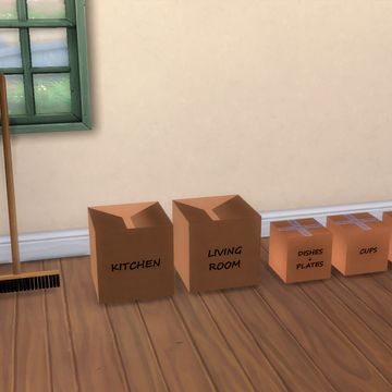 three boxes and a broom sitting on the floor in front of a wall with windows