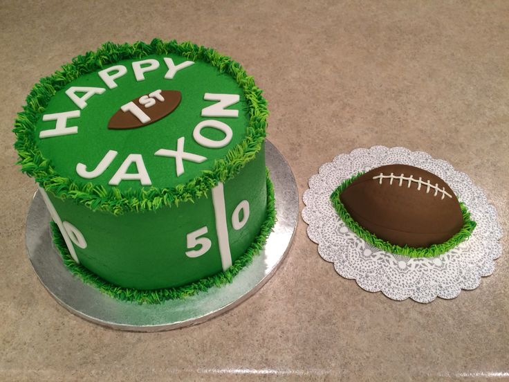 a green cake with a football on it and the words happy birthday next to it