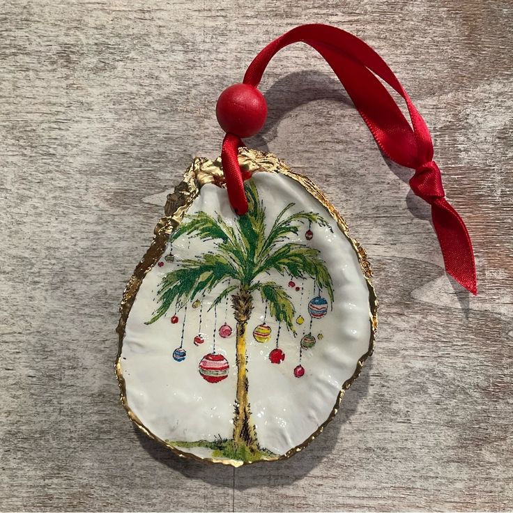 a ceramic ornament with a palm tree on it