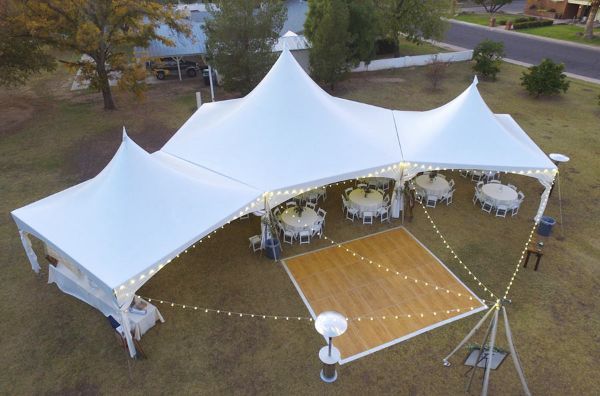 an overhead view of a large tent with tables and chairs