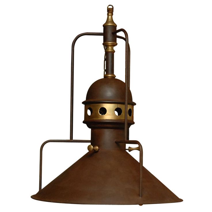 an industrial style light fixture on a white background