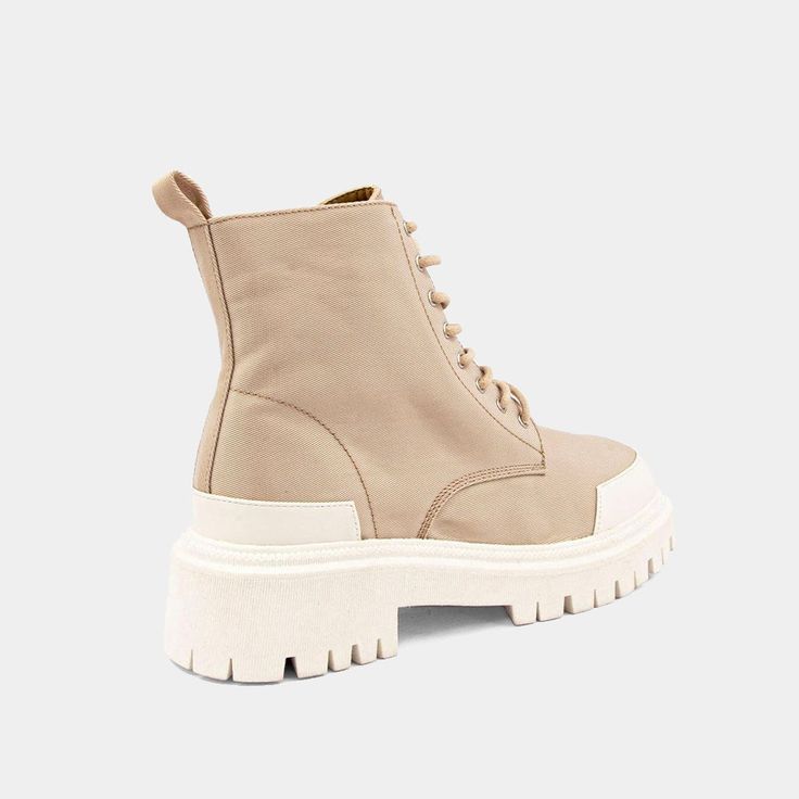 Our YESENIA boot is modeled on timeless combat styles. With rubber trims extending from the lug soles, wear this stylish pair to ground an ultra feminine dress. SIZE GUIDE Fashion Cupcakes, Affordable Shoes, Ultra Feminine, Combat Boot, White Heels, Feminine Dress, Cozy Sweater, Ribbed Fabric, Cozy Sweaters