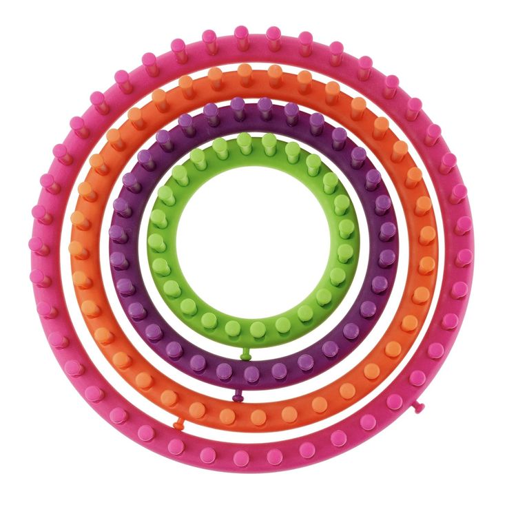 four different colored plastic beads arranged in a circle