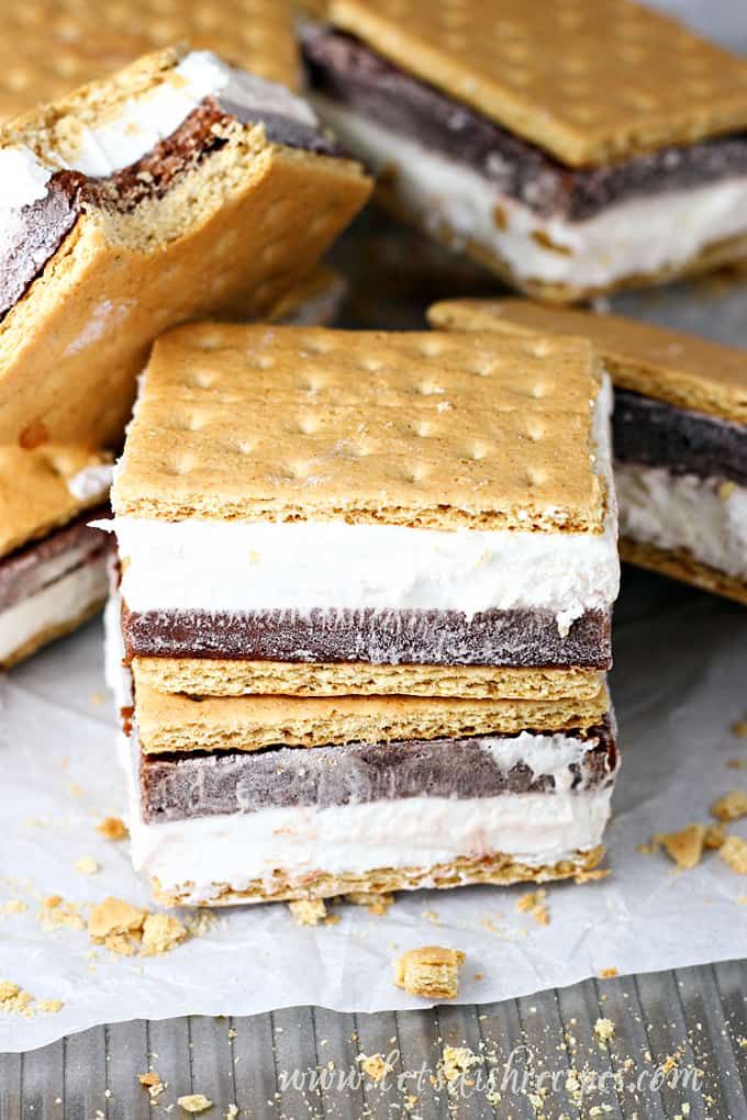 there are many desserts that are on the table together, including graham crackers and ice cream sandwiches