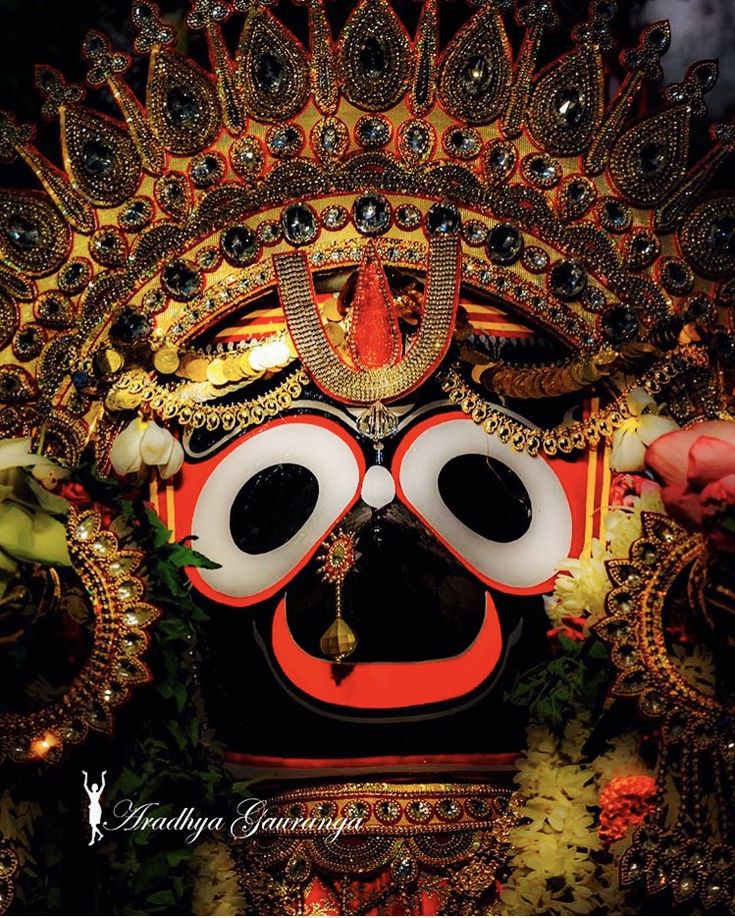 a close up of a mask with large eyes