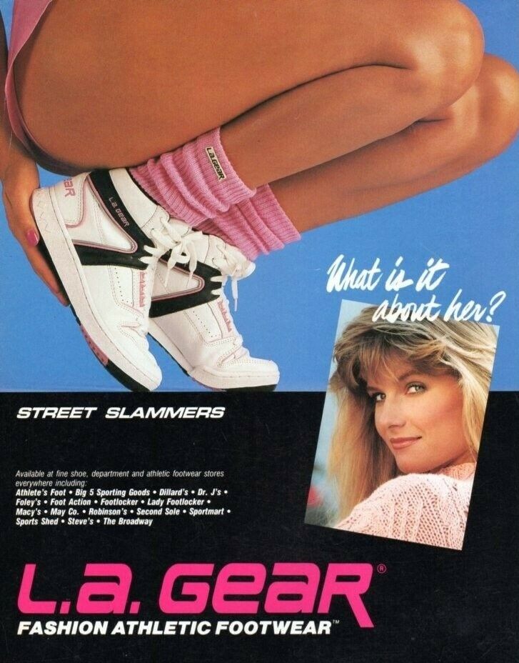 an ad for la gear featuring a woman's legs and shoes