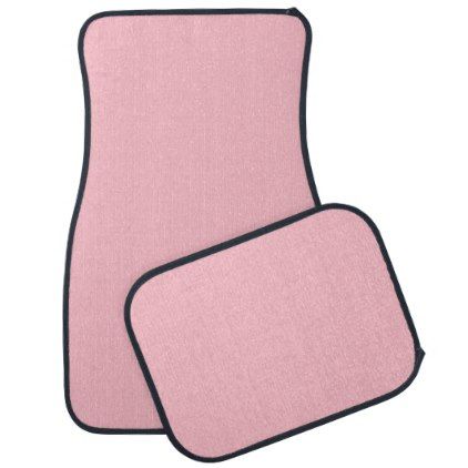 two pink carpet mats with black trim