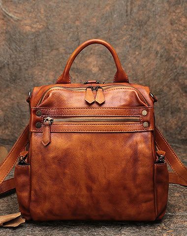 Overview： Design: Classic Leather Rucksack Womens Compact Leather Backpack Ladies Backpack PursesIn Stock: 3-5 Days To Process OrderInclude: A BagCustom: NoneMaterial: CowhideColor: Brown, Coffee, Red, Black GrayMeasures: 10 inches ( 28cm× 15cm× 26cm )Weight: 0.8kgSlots: 1 zip main slot, 1 inner slot, 1 zip inner slotStyle: Classic Leather Rucksack Womens Compact Leather Backpack Ladies Backpack PursesNote： Each item will have very slight variances to the pictured bag, and the consequence is tha Luxury Vintage Leather Backpack With Leather Handles, Luxury Vintage Leather Backpack Rectangular, Luxury Vintage Rectangular Leather Backpack, Luxury Vintage Brown Backpack, Cheap Leather Satchel Backpack, Affordable Vintage Leather Backpack For Travel, Affordable Leather Satchel Backpack, Cheap Vintage Satchel Backpack, Luxury Vintage Leather Backpack For School