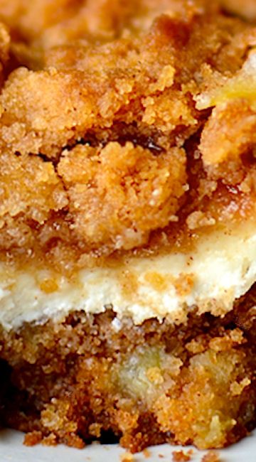 two pieces of cake sitting on top of a white plate