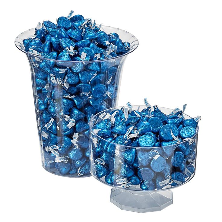 two clear vases filled with blue candy