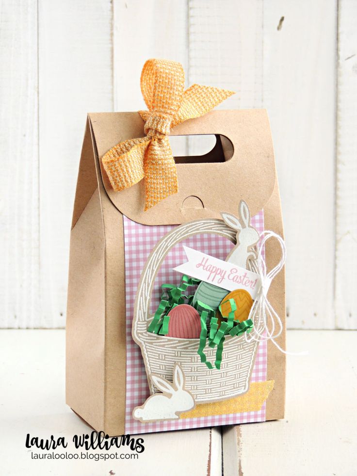 a brown paper bag with an easter basket on it