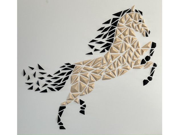 a horse made out of black and white geometric shapes on a wall in the shape of triangles