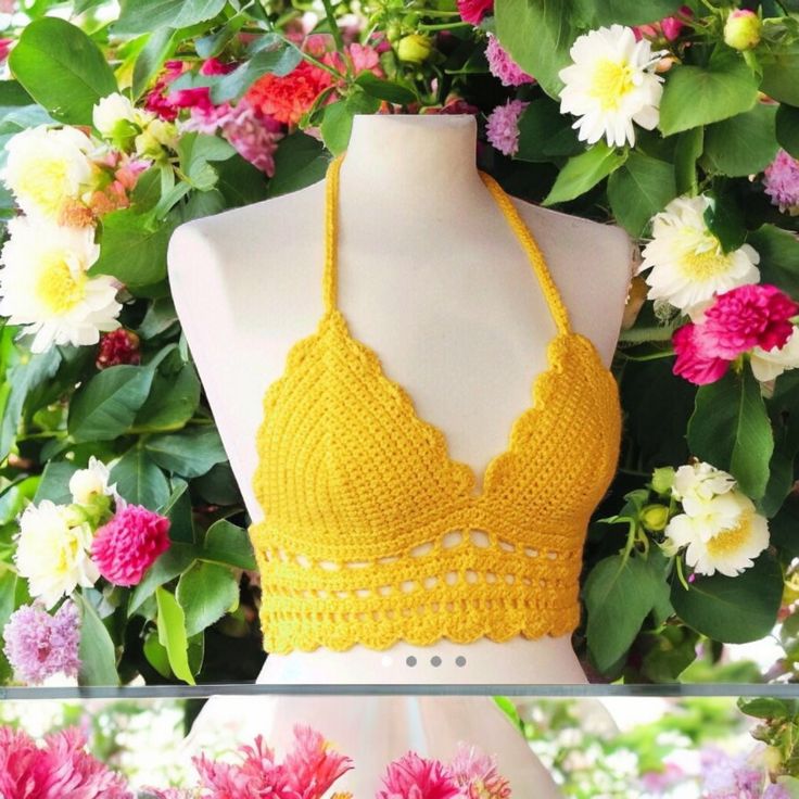 Handmade crochet crop top/bralette shade yellow! Made out of acrylic yarn.  Would fit a b-c cup best and has adjustable straps around the neck and back!  Perfect to wear with Harem pants in the summer to festivals or on holiday!  This item pictured is a size Medium. Full Sizing details:  Small - A-B cup  Medium - B-C cup Large - D cup  XL - DD cup Sizes vary depending on the coverage you want so if you aren't sure what size to get or want it made to your exact bra size please message me.   Items can be machine washed at 30o and laid flat for drying. All items with decorative charms or beading should be hand washed in Luke warm water and laid flat for drying. DO NOT TUMBLE DRY.  Custom orders in other colours are welcome! Summer Yellow Bra With Comfort Fit, Festival Bra Friendly Cropped Top, Cropped Bra For Summer Beach, Cropped Bra For Beach In Summer, Summer Cropped Bra For Beach, Yellow Crochet Lace Top For Summer, Fitted Yellow Bra For Summer, Seamless Cropped Crochet Top For Summer, Fitted Seamless Cropped Crochet Top