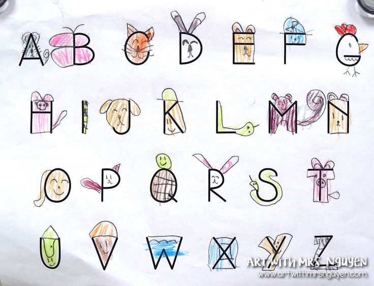 a child's drawing of letters and numbers on paper