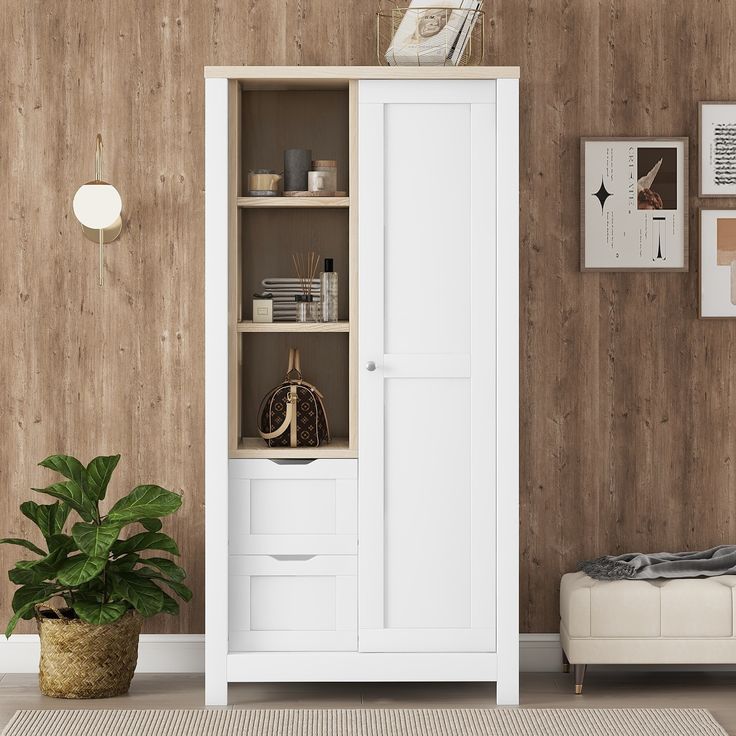 a white cabinet with shelves and drawers in a living room next to a potted plant